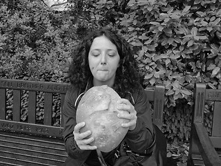 Image showing Girl eating bread