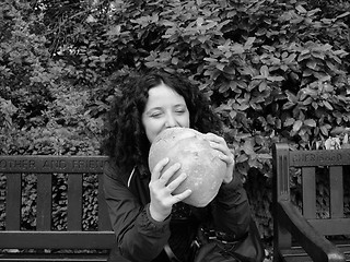 Image showing Girl eating bread