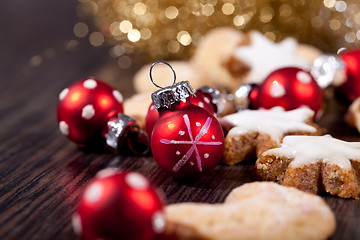 Image showing fresh tasty christmas cinnamon cookies and sticks decoration 