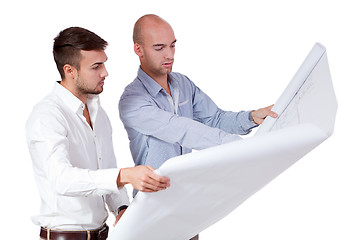 Image showing young adult businessman architect with blueprint 