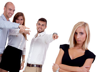 Image showing young businesswoman bullying mobbing by team isolated 