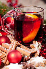 Image showing hot tasty spicy mulled red wine with orange and cinnamon christmas 