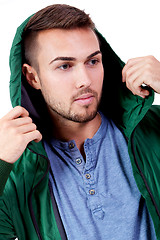 Image showing young adult man with green jacket portrait isolated