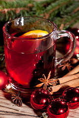 Image showing hot tasty spicy mulled red wine with orange and cinnamon christmas 