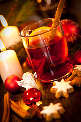 Image showing hot tasty spicy mulled red wine with orange and cinnamon christmas 