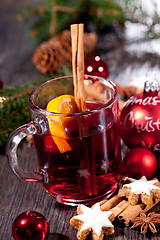 Image showing hot tasty spicy mulled red wine with orange and cinnamon christmas 