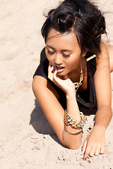 Image showing beautiful asian woman with colorful makeup on the beach 