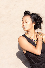 Image showing beautiful asian woman with colorful makeup on the beach 