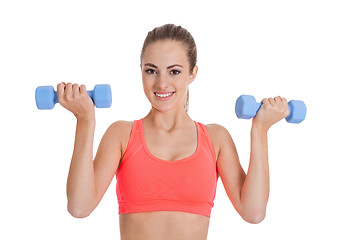 Image showing healthy smiling girl workout with dumbbell isolated 