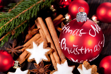 Image showing fresh tasty christmas cinnamon cookies and sticks decoration 