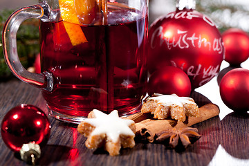 Image showing hot tasty spicy mulled red wine with orange and cinnamon christmas 