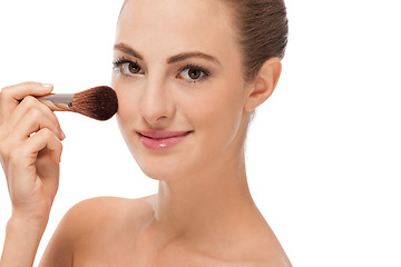 Image showing apllying powder make up on face portrait