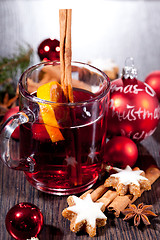 Image showing hot tasty spicy mulled red wine with orange and cinnamon christmas 