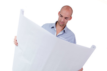 Image showing young adult businessman architect with blueprint 