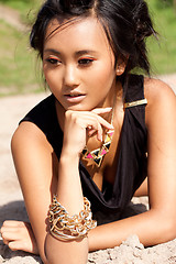 Image showing beautiful asian woman with colorful makeup on the beach 