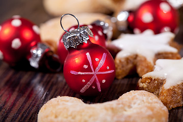 Image showing fresh tasty christmas cinnamon cookies and sticks decoration 