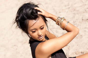 Image showing beautiful asian woman with colorful makeup on the beach 