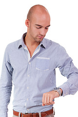 Image showing young adult business man looking at watch portrait