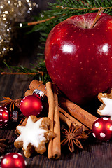 Image showing fresh tasty christmas cinnamon cookies and sticks decoration 