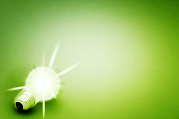 Image showing Background with lit lightbulb