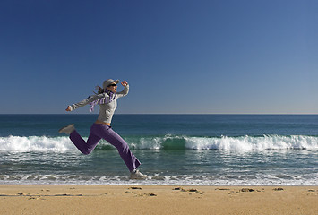 Image showing Jumping on the beach