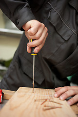 Image showing Man with screwdriver