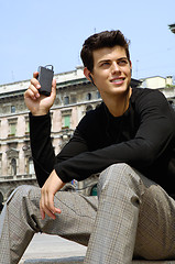 Image showing young man listening to music