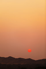 Image showing Sunset over the hills