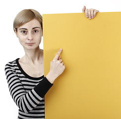 Image showing Woman holding a paper