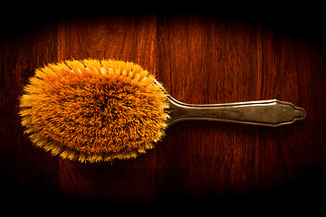 Image showing Hairbrush on wood