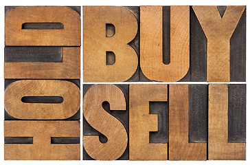 Image showing buy, hold, sell in wood type