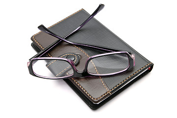 Image showing notebook and glasses 