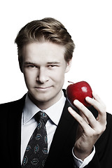 Image showing Businessman and apple 