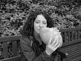 Image showing Girl eating bread