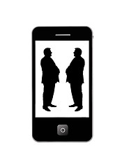 Image showing Modern mobile phone with two silhouettes of men