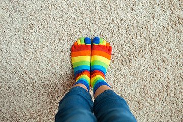 Image showing legs in striped socks