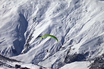 Image showing Speed flying in winter mountains