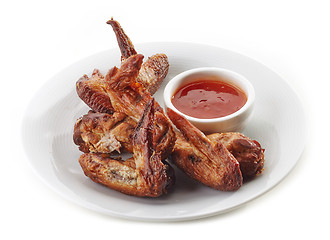 Image showing chicken wings and chili sauce