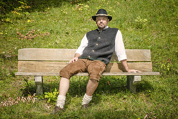 Image showing Bavarian man on bench