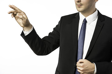 Image showing Closeup businessman holding his right hand up