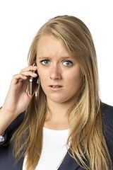 Image showing Blond phoning serious woman