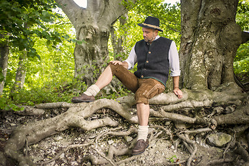 Image showing Sitting traditional Bavarian man