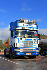 Image showing Sunlight on Blue and White Scania Truck in Autumn