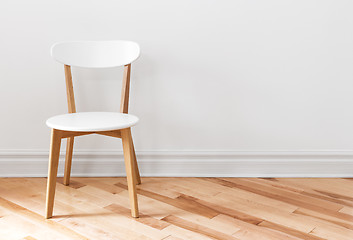 Image showing White chair in an empty room