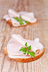 Image showing bread with sliced ham and parsley