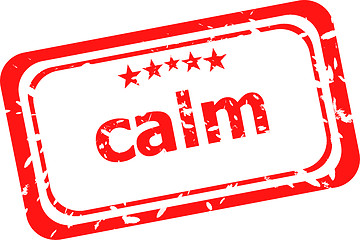 Image showing calm on red rubber stamp over a white background