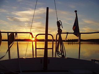 Image showing Sailboat in a sunset,