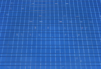 Image showing Glass-windowed wall of skyscraper