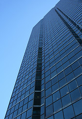 Image showing Blue glass-windowed skyscraper
