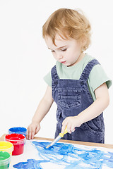 Image showing cute child making picture